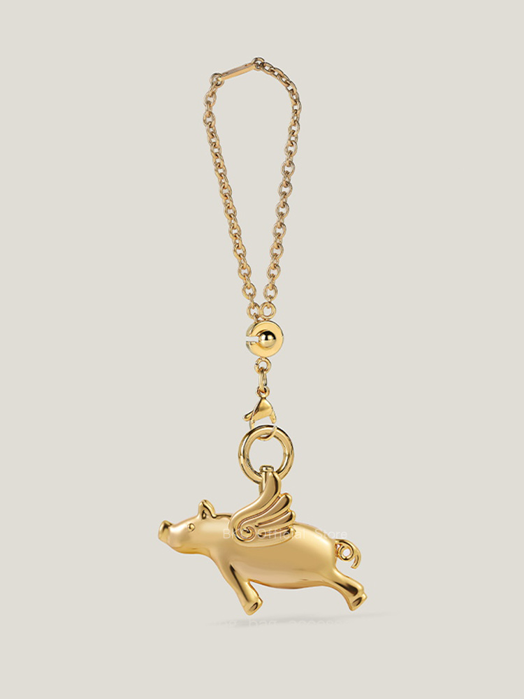 Luxury Brass Fliggy Bag Charm  - مراجعة Luxury Bags Hermes Birkin وسعره